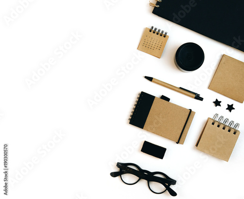 Flat lay Mockup Item Set On White Desk. Craft Notebooks photo