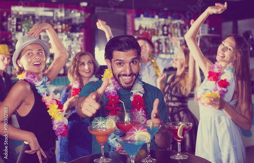 Canvas Print male is having fun on the hawaiian party