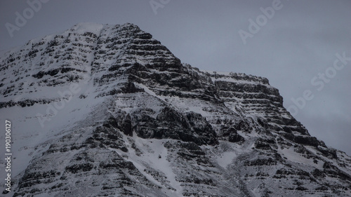 Dramatic cliffs during winter in Iceland © DanielFreyr