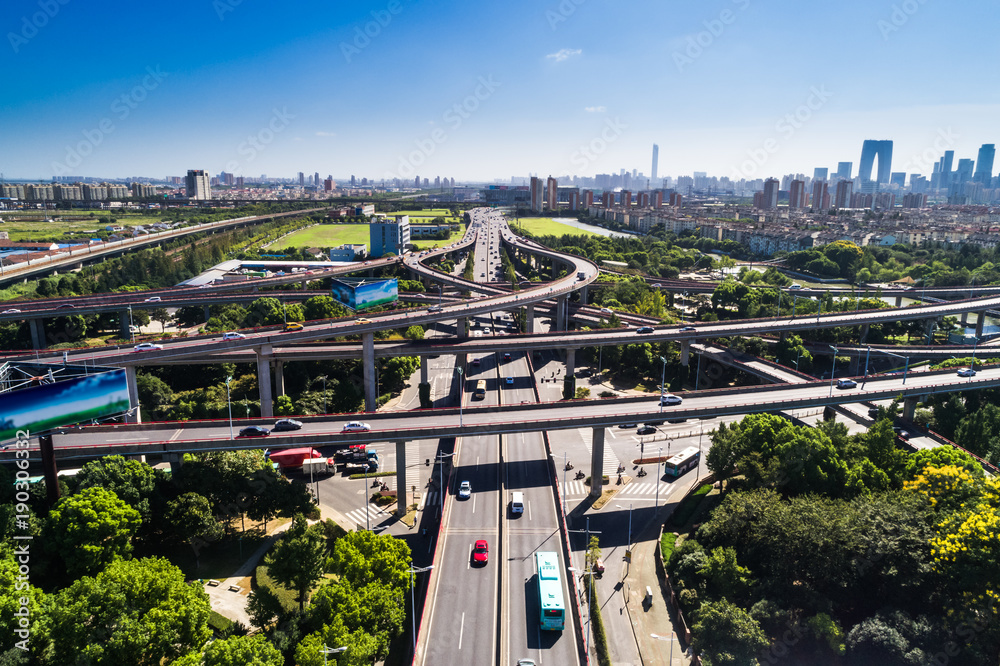 Poster Aerial view massive highway intersection, stack interchange with ...