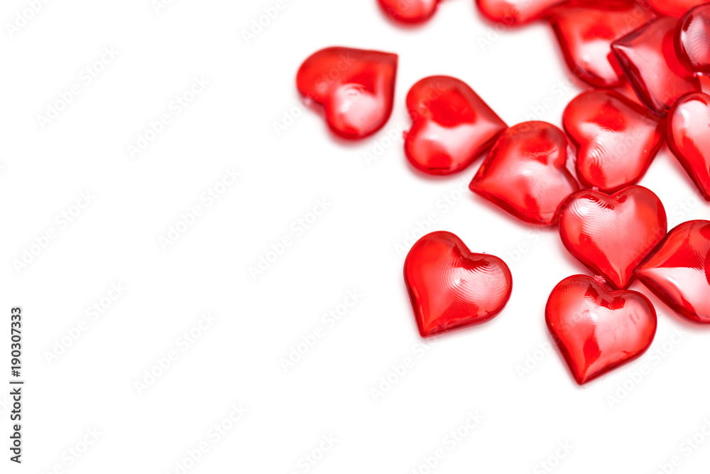 Red love hearts on a plain white background