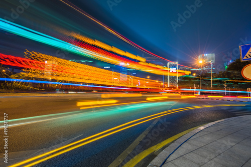 Vehicle light trails in city at night. © hallojulie