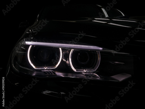 Modern car headlights. Exterior detail.