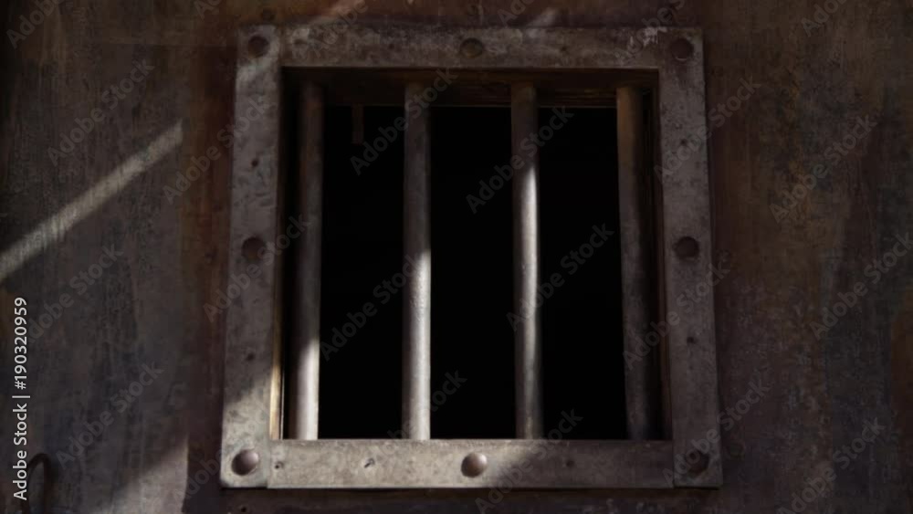 Old west jail door window straight on symmetrical Old west jail door window straight on symmetrical