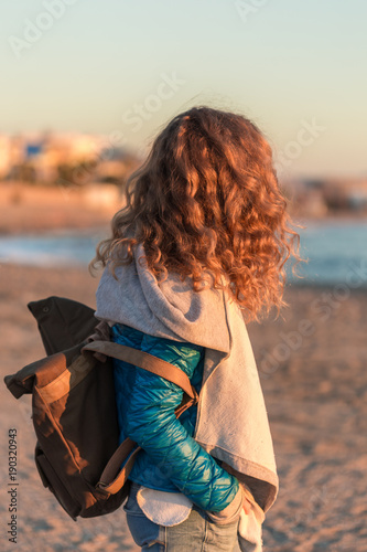 Solo traveller female with backpack