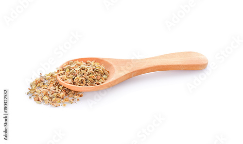 Oregano in wood spoon