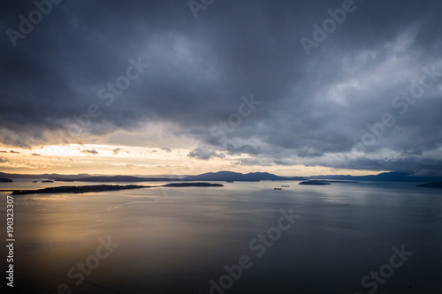 View of islands in Puget Sound during a cloudy sunset