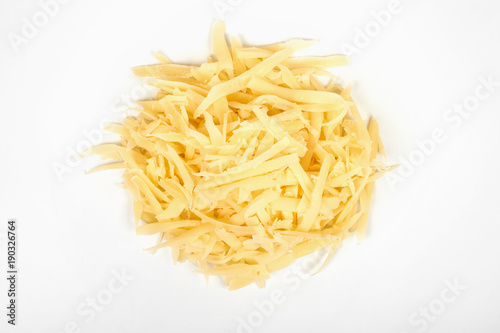 Heap of grated cheese, isolated on white background.