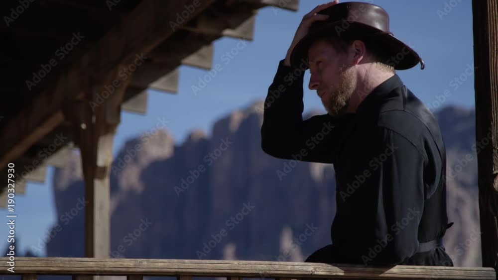 Cowboy taking a siesta on ranch in mountains desert Cowboy taking a siesta on ranch in mountains desert