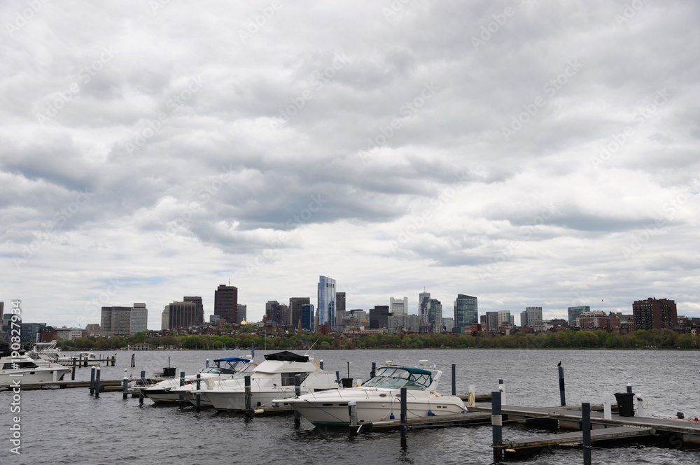 Yacht and boat in harbor of Charles river in cloudy day