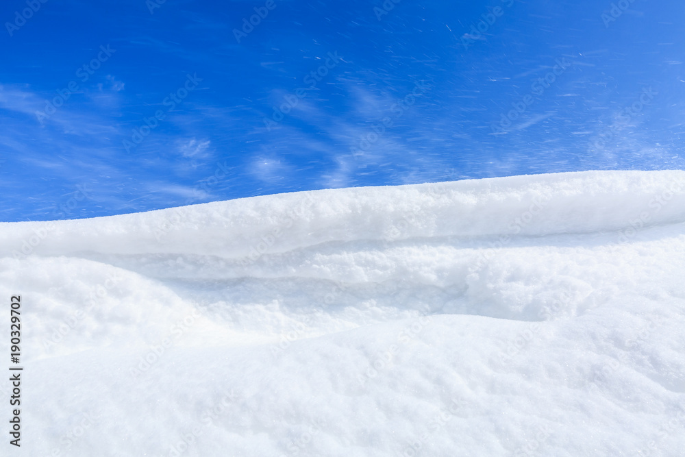 beautiful snow and blue sky natural background in winter