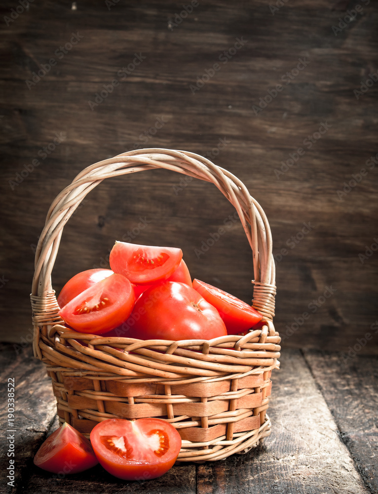 Fresh tomatoes in a basket. Fresh tomatoes in a basket.