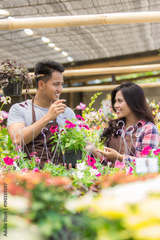 asian male and female florist