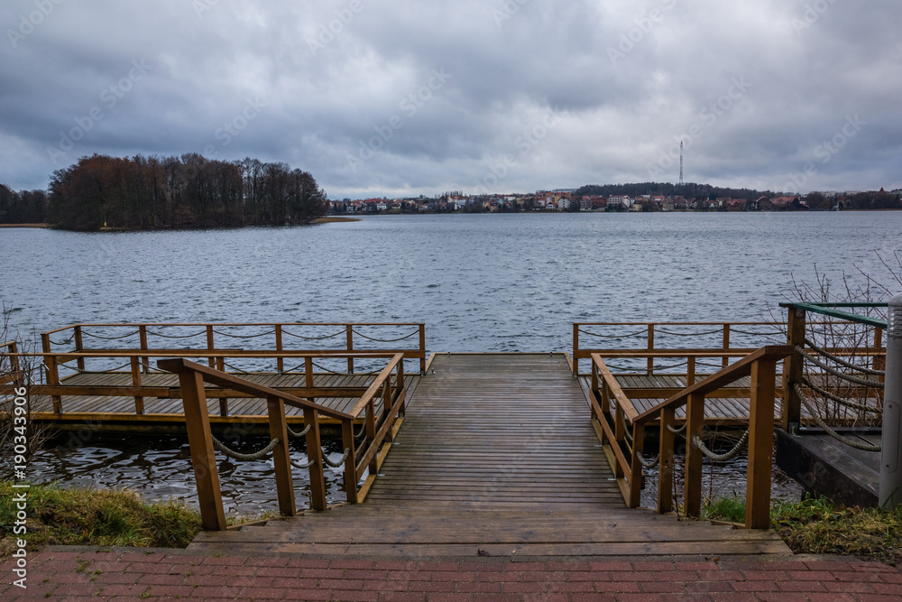 Footbridge on the Czos lake in Mragowo, Masuria, Poland