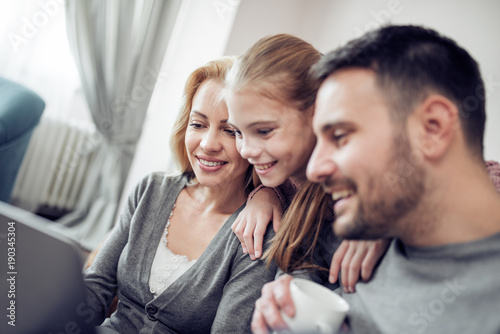 Family watching movie together