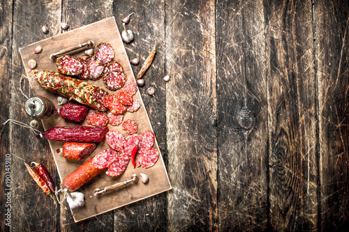 Different kinds of salami on the boards.