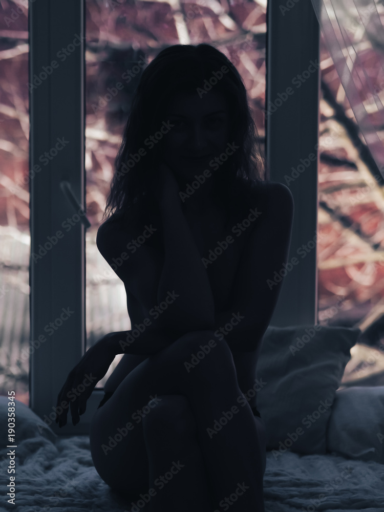 Obraz premium Young brunette model posing naked