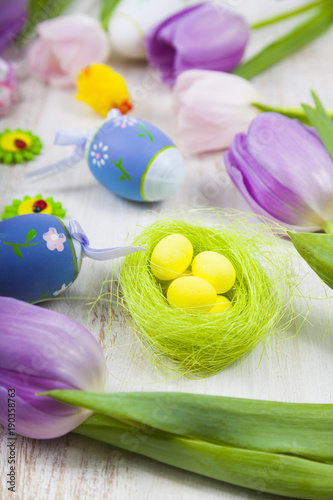 Fototapeta Naklejka Na Ścianę i Meble -  Bouquet purple tulips and Easter eggs