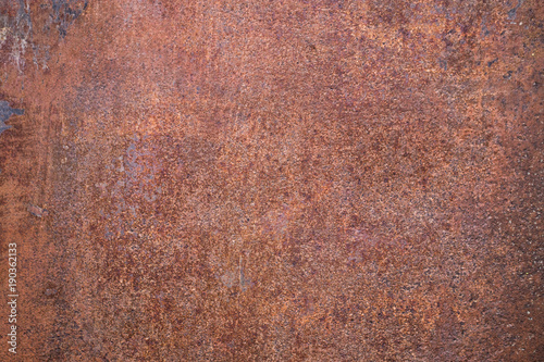 Worn dark brown rusty metal texture background