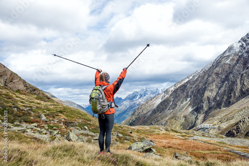 Young woman hiking in the mountains