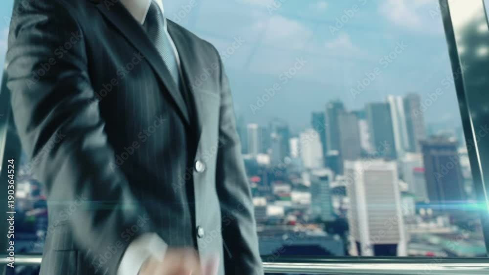 Businessman handshaking at important meeting in Jakarta Businessman handshaking at important meeting in Jakarta