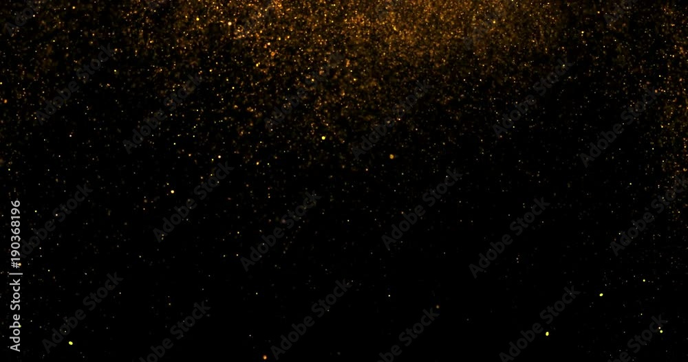 waterfalls of golden glitter sparkle bubbles champagne particles stars on black background,happy new year holiday concept