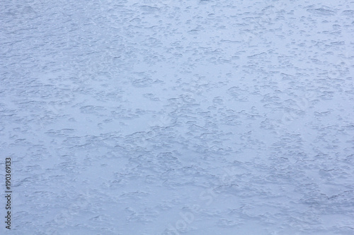 Frozen water, ice texture, winter background.