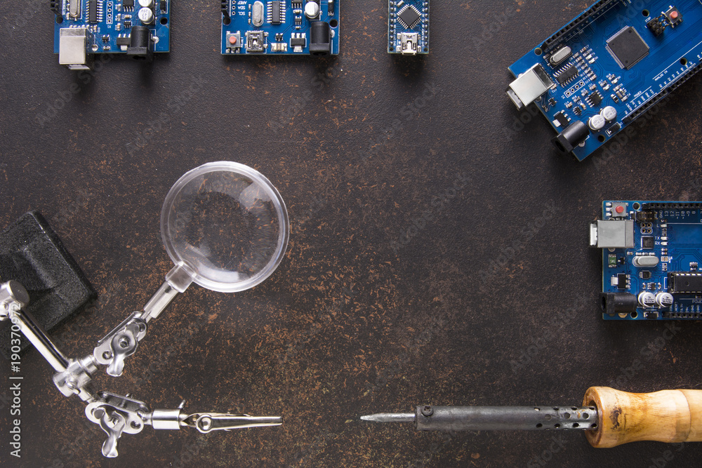 Five Arduino Boards Flat Layout On A Rusty Background Mega Nano And Five Arduino Boards Flat Layout On A Rusty Background Mega Nano And