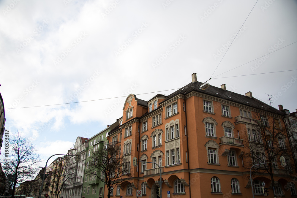 Fototapeta premium Row of houses with old building houses in Schwabing, colorful facade