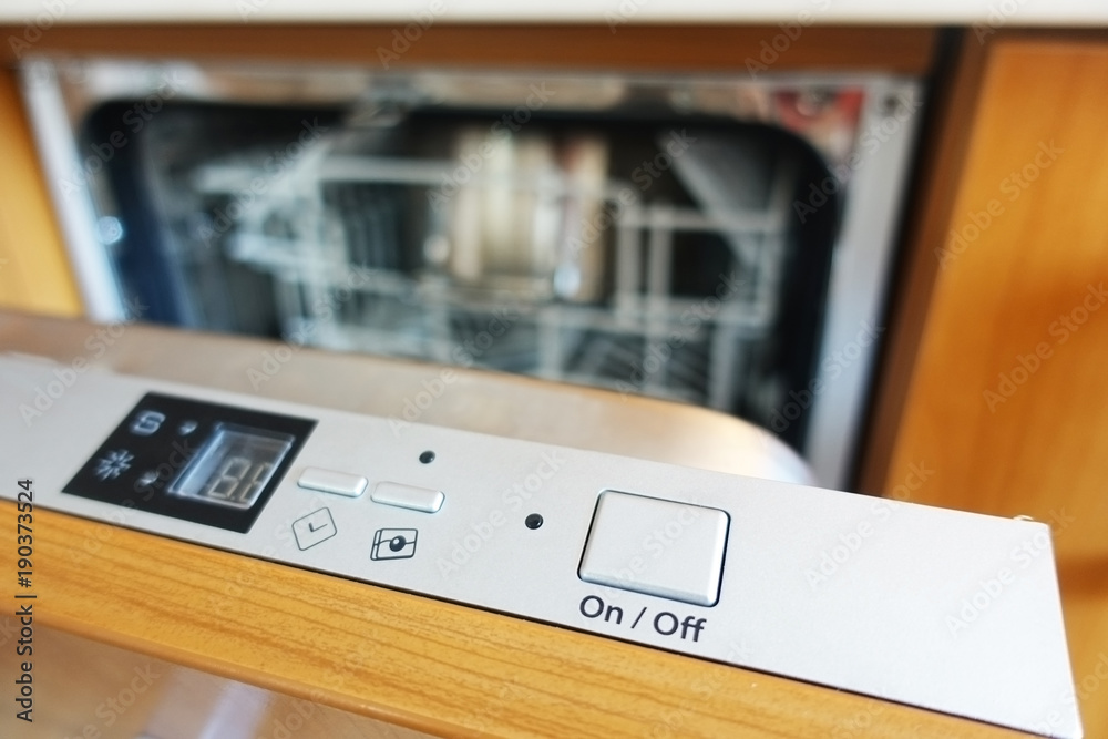 Obraz premium Control panel of a built-in dishwasher machine 