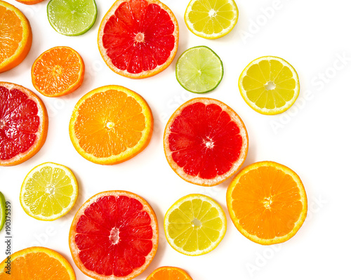 citrus fruit slices isolated on white