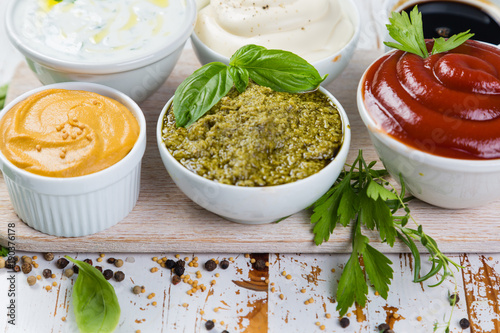 Selection of different sauces in bowls