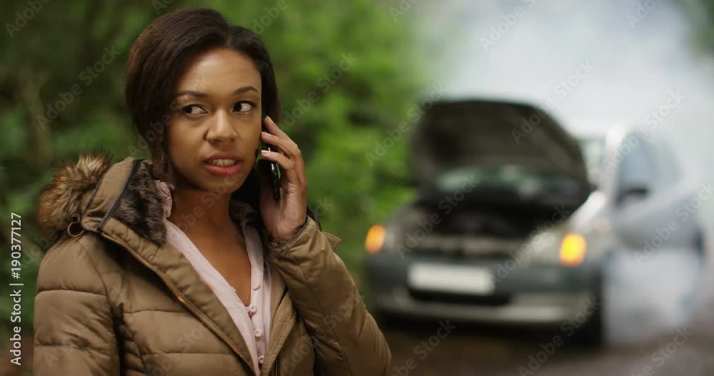 4k, A woman calling roadside assistance for help with her car trouble. Slow motion. 4k, A woman calling roadside assistance for help with her car trouble. Slow motion.