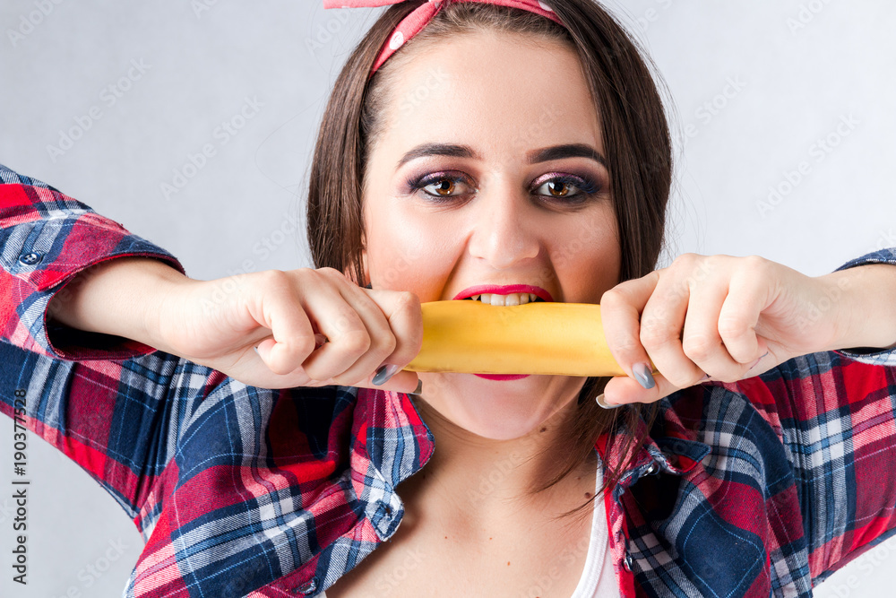 Healthy food fat woman concept, Hungry girl XXL say no bad food, Model plus size biting banana female well-fed fatty stomach web design banner poster isolated place for text loss weight want be thin Healthy food fat woman concept, Hungry girl XXL say no bad food, Model plus size biting banana female well-fed fatty stomach web design banner poster isolated place for text loss weight want be thin