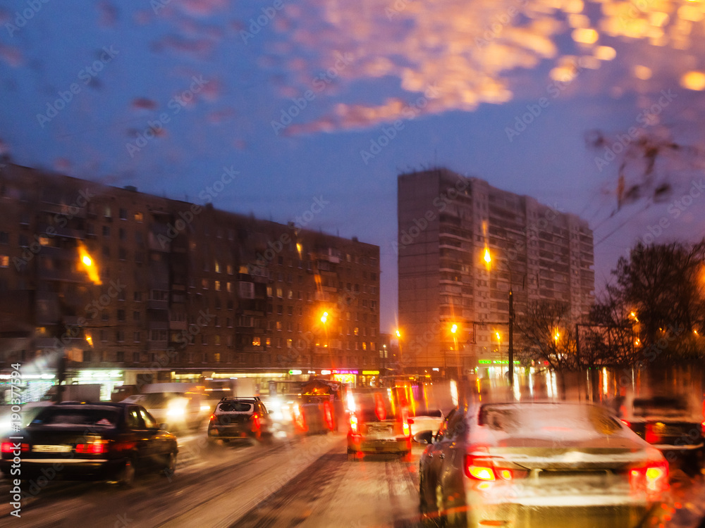 car traffic in Moscow city in snowy evening