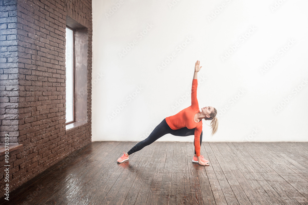 Pilates poses. Instructor woman doing pilates pose Pilates poses. Instructor woman doing pilates pose