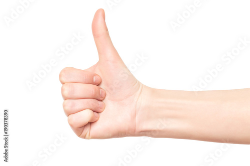 Closeup mockup of female hand with thumb up gesturing success isolated at white background. © Mayatnikstudio