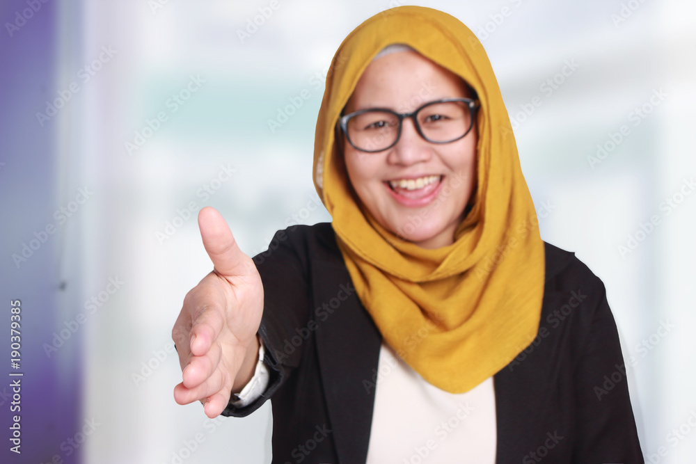 Muslim Businesswoman Offering Handshake Gesture