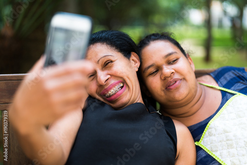 Friends Taking a Selfie with Mobile