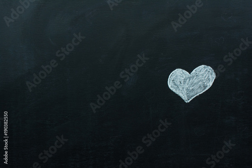 Love heart symbol on a blackboard  Creative Love or Valentine s Day Concept
