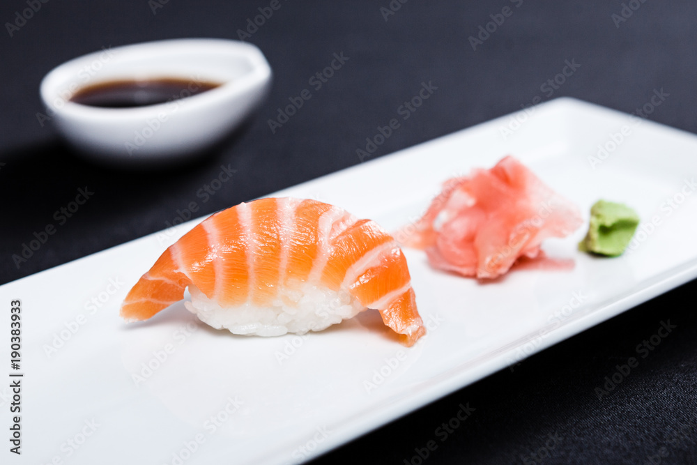 Salmon sushi served on a plate Salmon sushi served on a plate