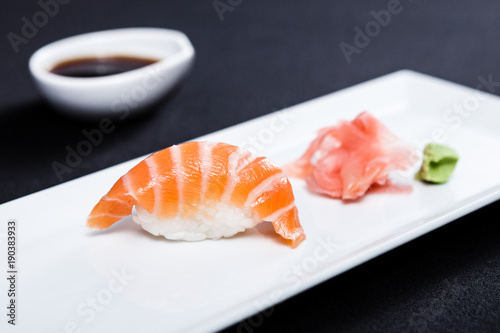 Salmon sushi served on a plate