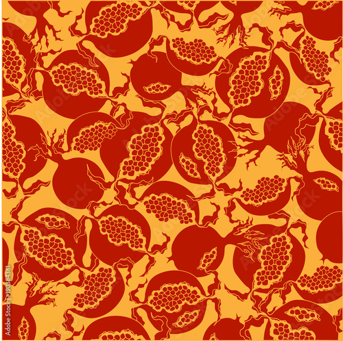 Bright fruit design element . Bright red slice of pomegranate on a yellow background.