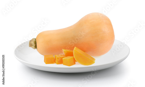 butternut squash in plate isolated on a white backgroundund photo