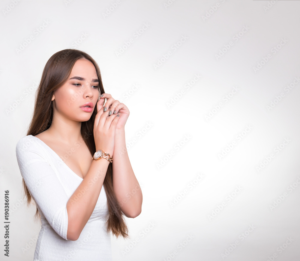 beautiful young woman with long hair wearing wrist watch beautiful young woman with long hair wearing wrist watch