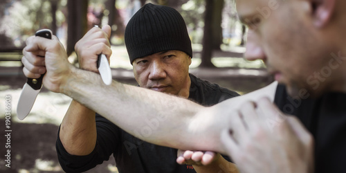 Lameco Astig Combatives. Knife vs knife self defense disarming technique photo