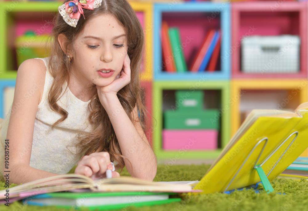 little cute girl doing homework little cute girl doing homework