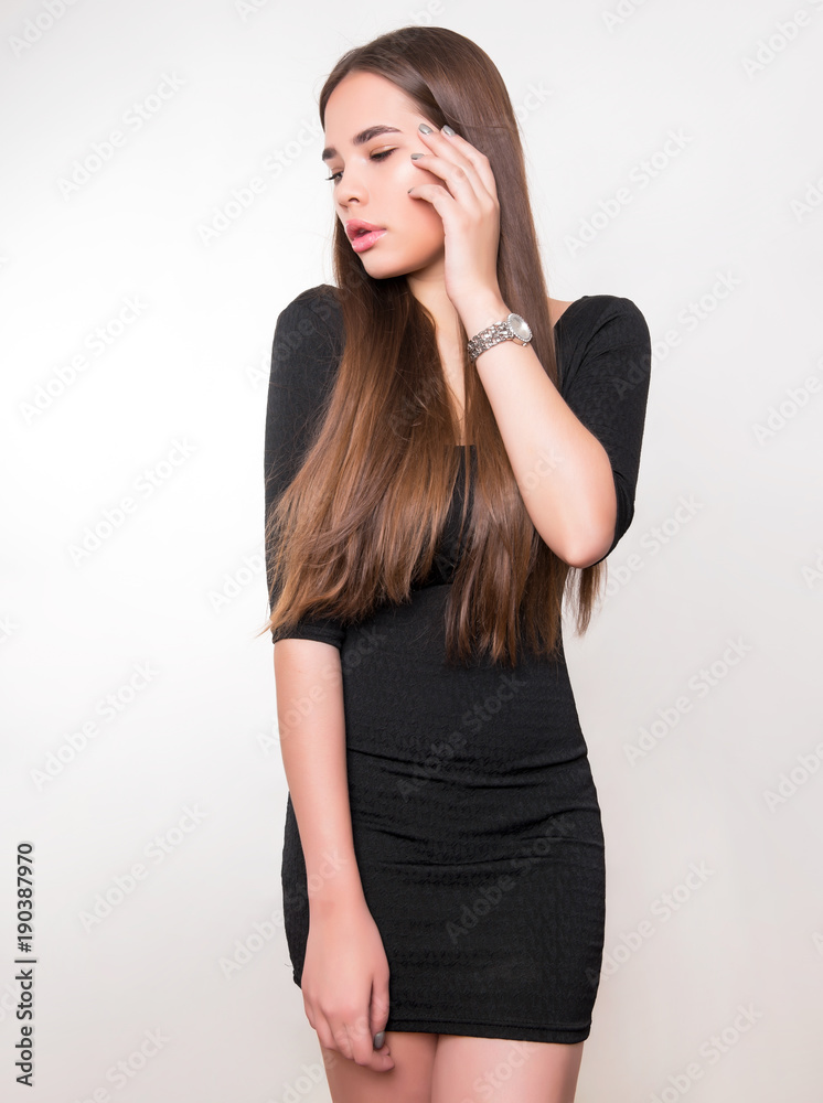 beautiful young woman with long hair wearing wrist watch beautiful young woman with long hair wearing wrist watch
