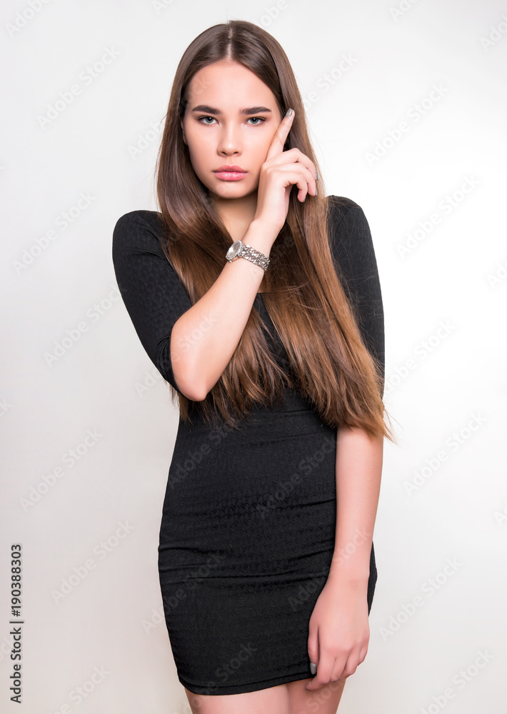 beautiful young woman with long hair wearing wrist watch beautiful young woman with long hair wearing wrist watch