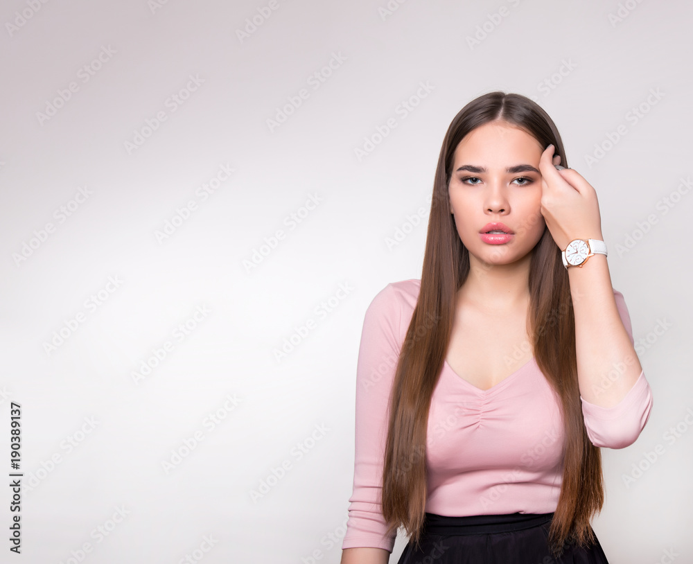 beautiful young woman with long hair wearing wrist watch beautiful young woman with long hair wearing wrist watch